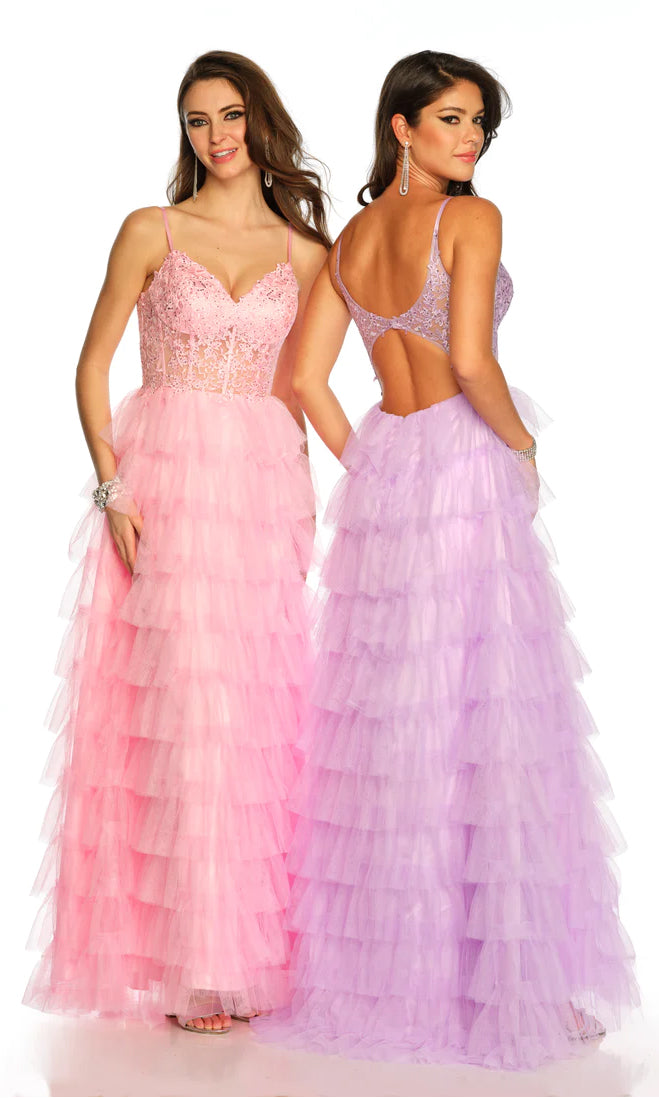 Two women in formal designer gowns: one wears a light pink lace v-neck prom dress with spaghetti straps, while the other shines in the Dave and Johnny Long Tiered Prom Dress 11148—a lavender gown with an open back and statement earrings.